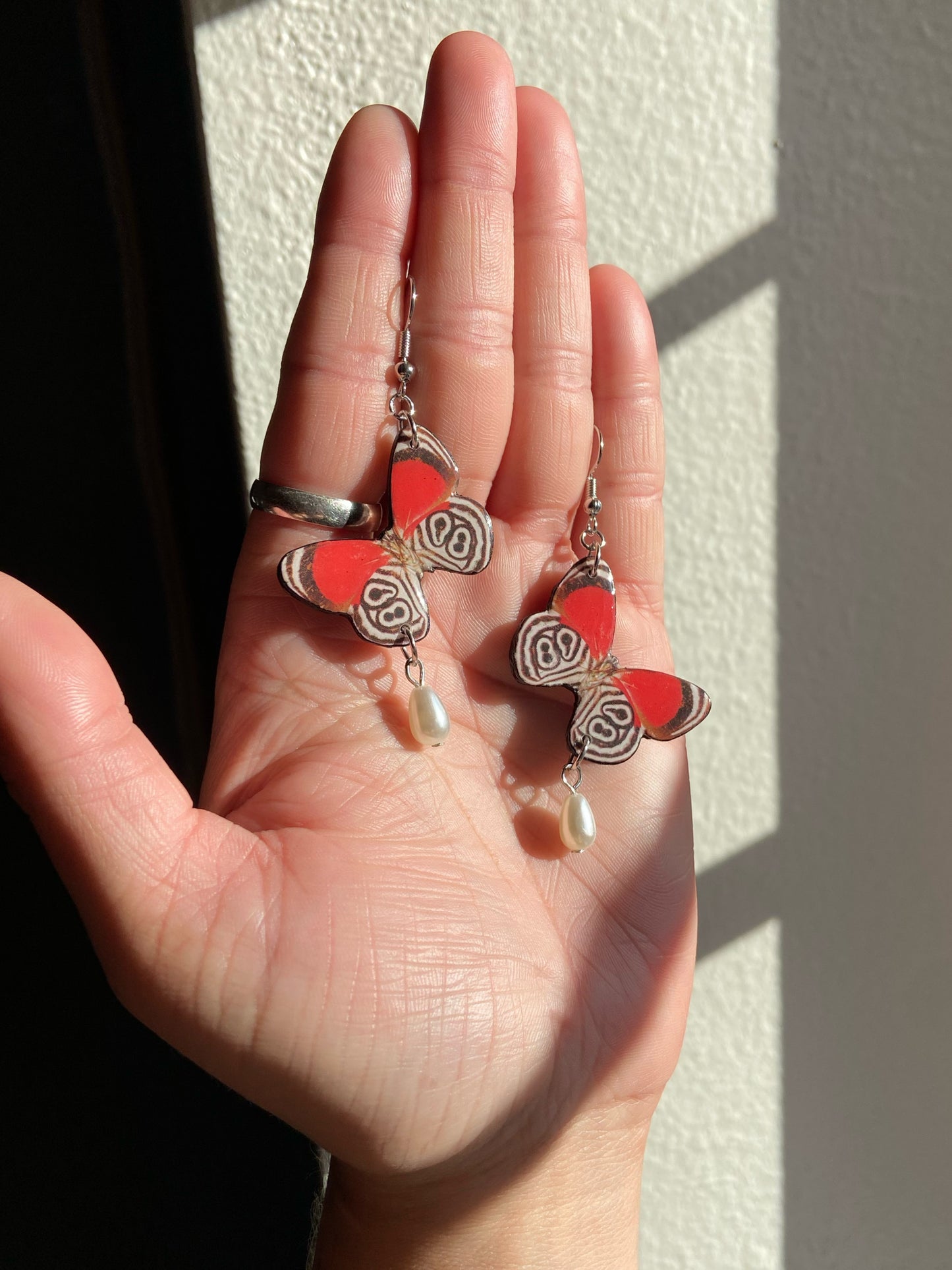 Butterfly Wings - Upcycled red, black and white paper butterflies with pearl drop dangle beads