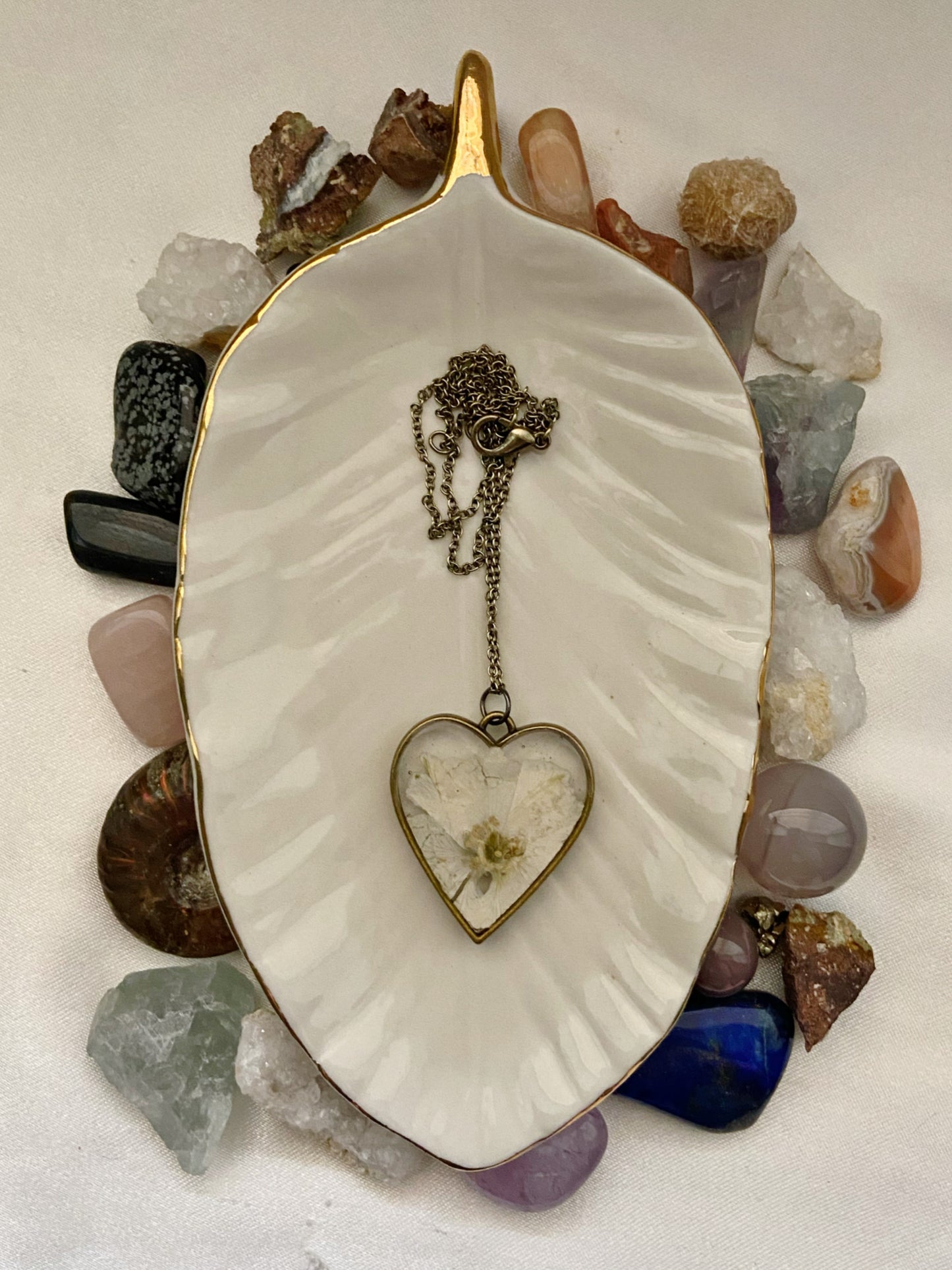 Larkspur- Pressed white flower inside large bronze open heart pendant, 16" bronze chain included