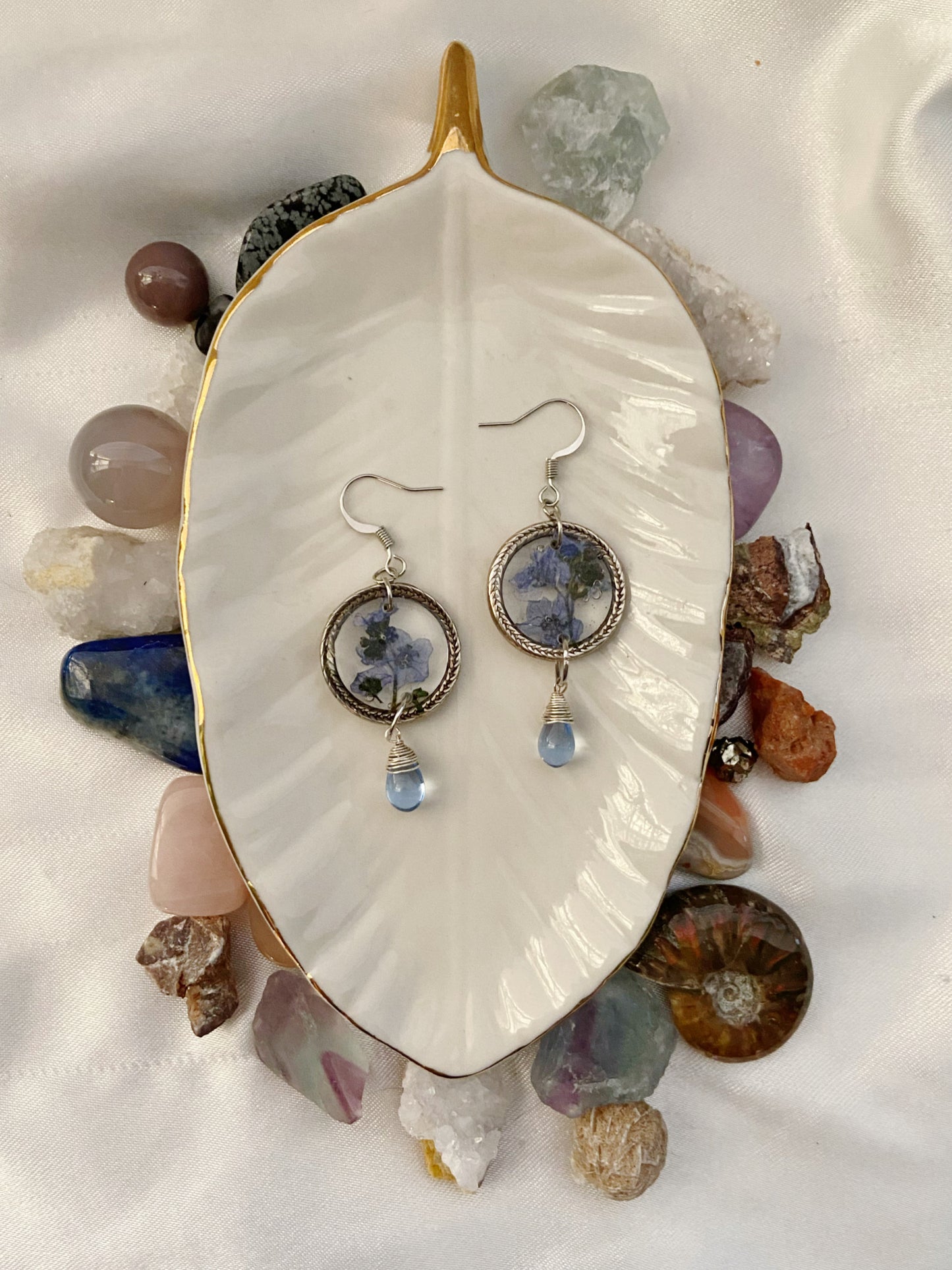 Forget Me Nots- Real blue flower clusters inside open silver leaf-patterned circle earrings with blue glass drop beads
