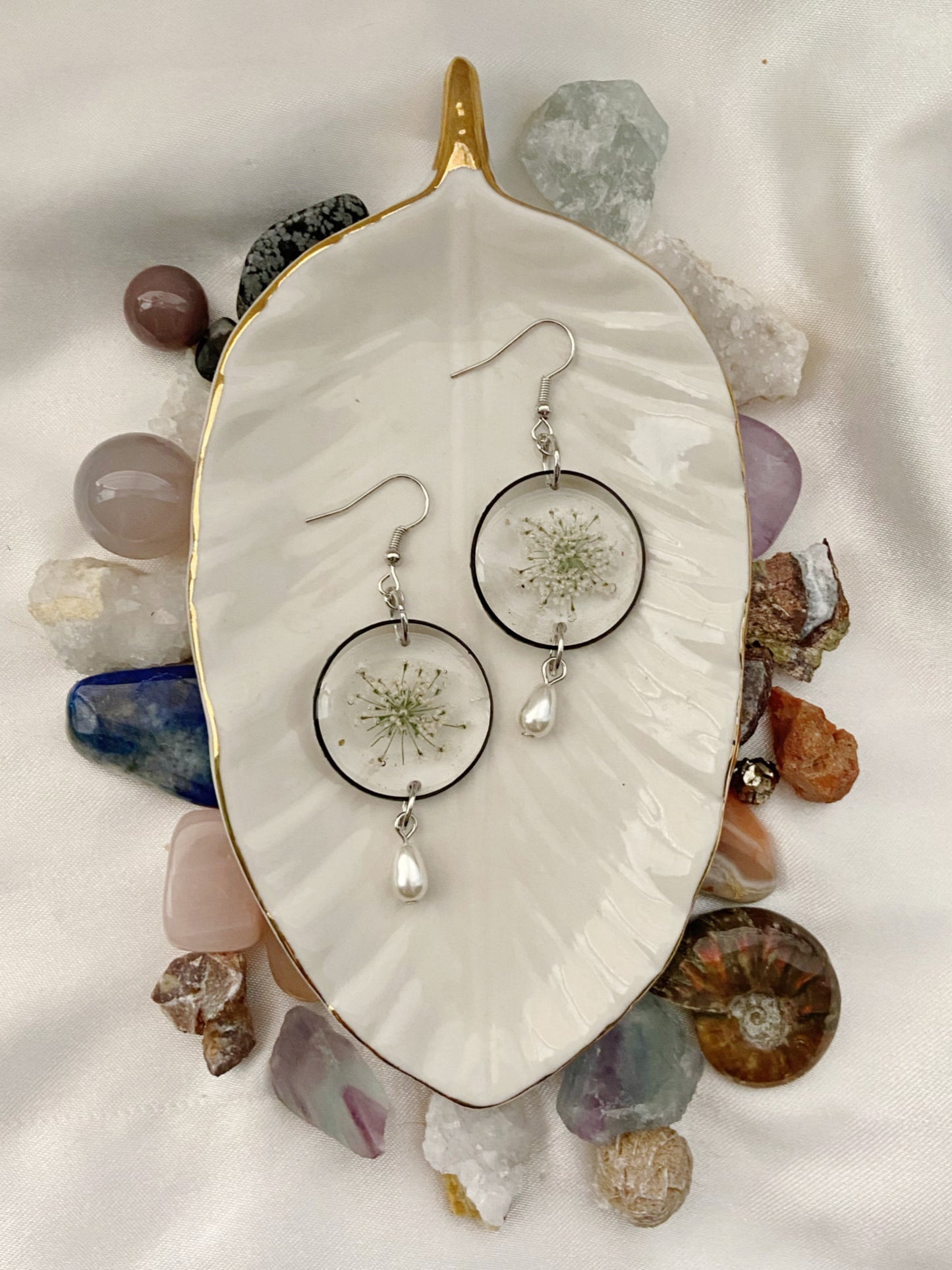 Queen Anne's Lace- Pressed white flowers inside black open circle earrings with a faux pearl drop bead