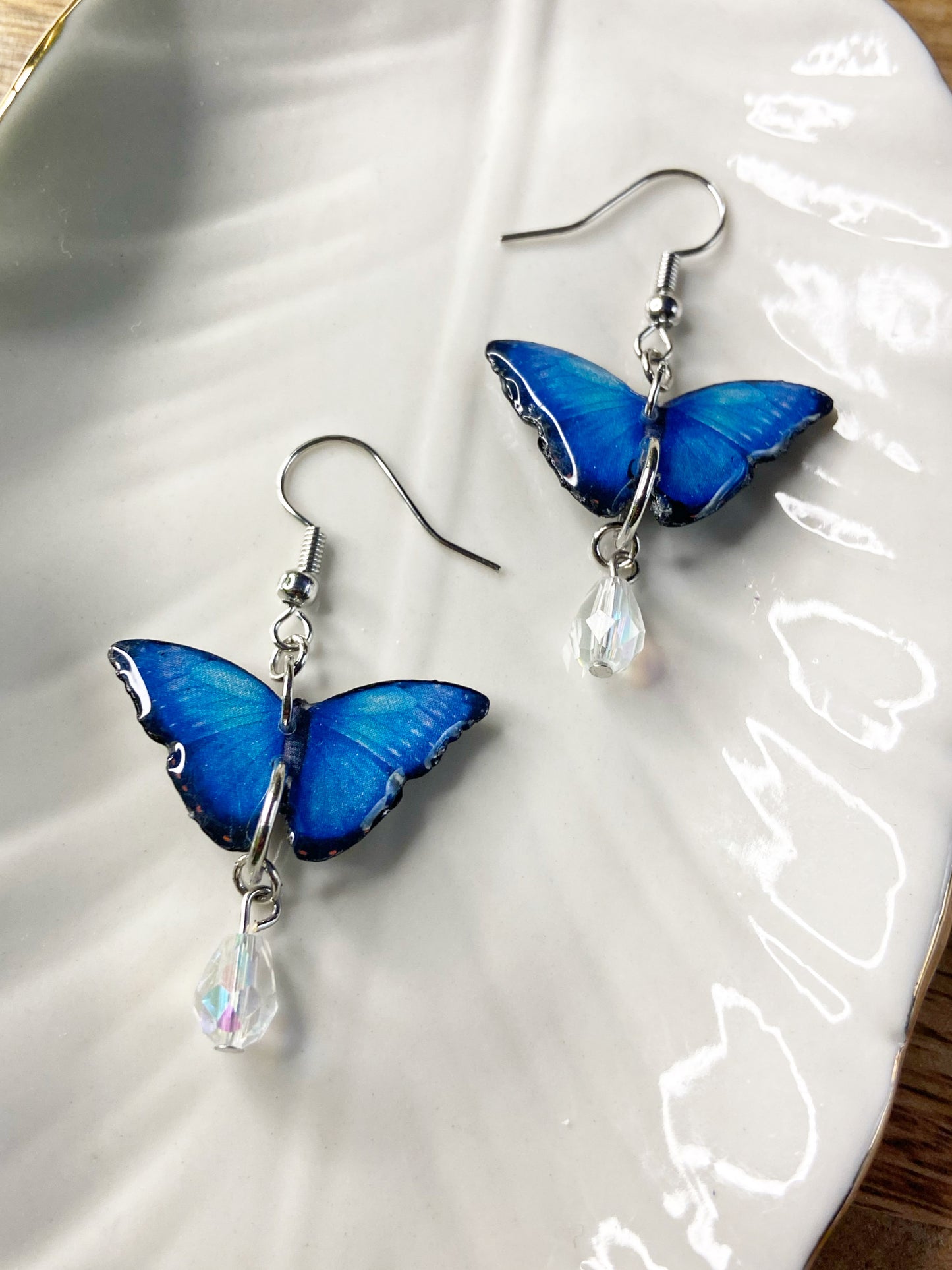 Mini Butterflies- Blue morpho upcycled paper earrings with iridescent glass bead dangle