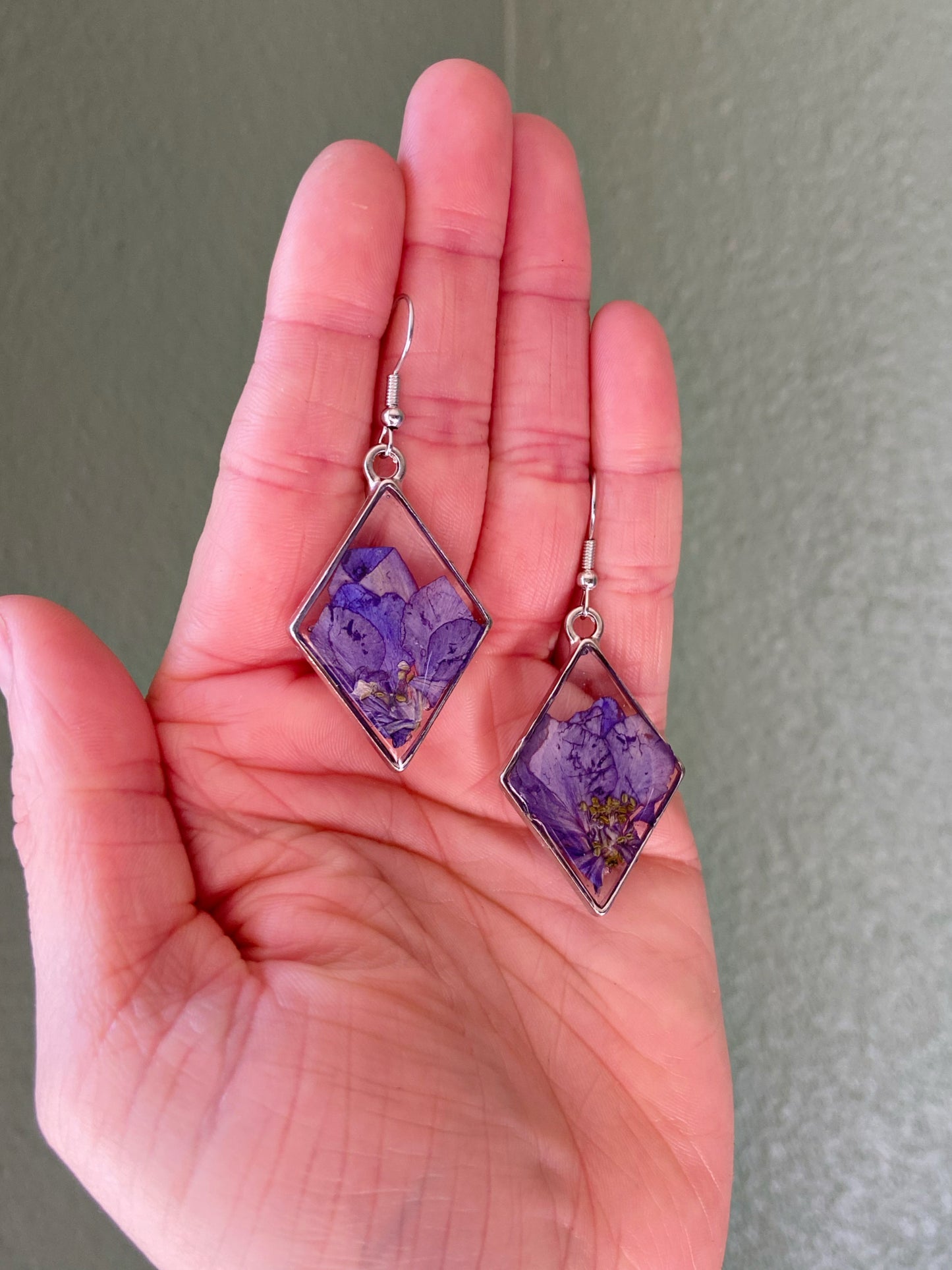 Larkspur- Purple pressed flowers inside silver open diamond-shaped earrings, preserved botanical jewelry