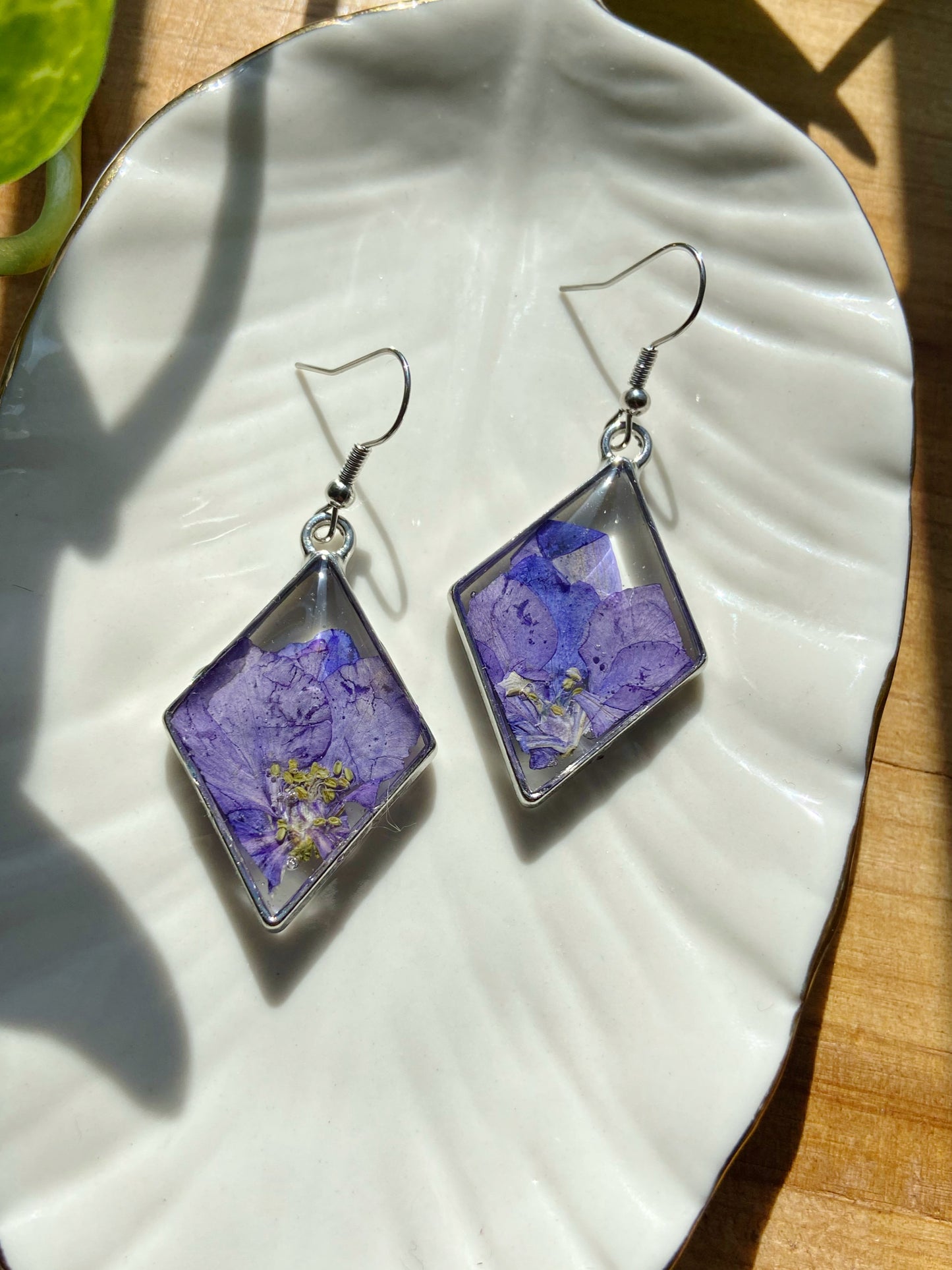 Larkspur- Purple pressed flowers inside silver open diamond-shaped earrings, preserved botanical jewelry