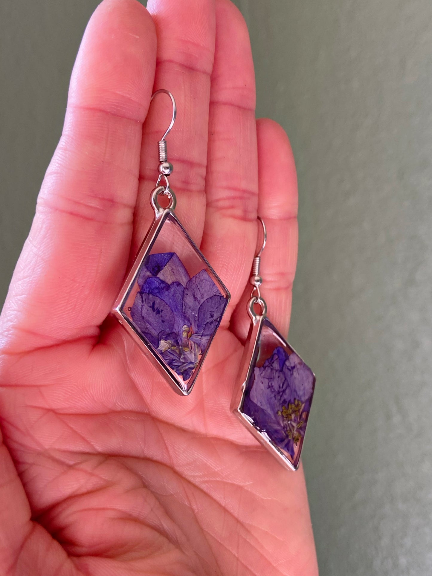 Larkspur- Purple pressed flowers inside silver open diamond-shaped earrings, preserved botanical jewelry