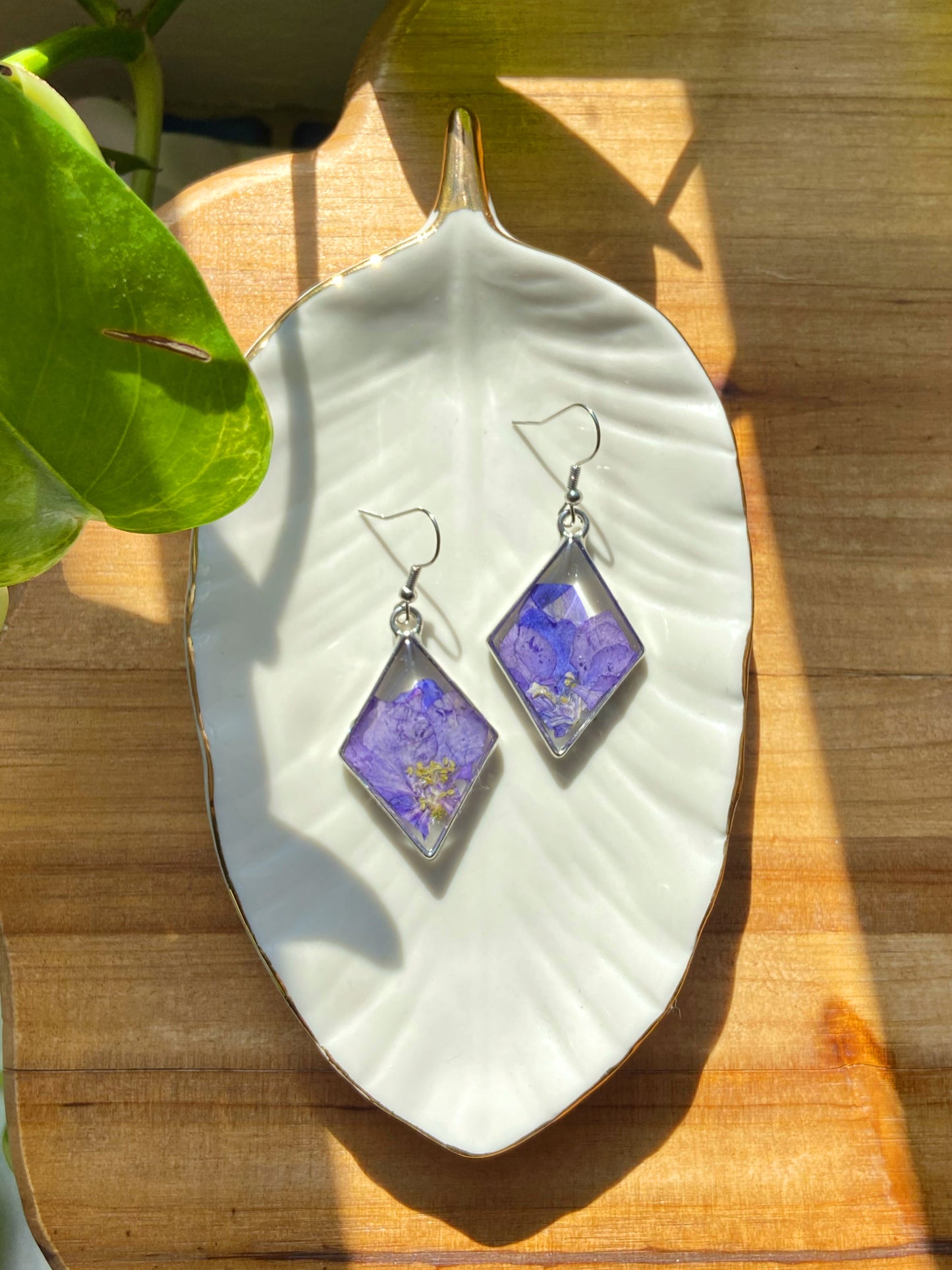 Larkspur- Purple pressed flowers inside silver open diamond-shaped earrings, preserved botanical jewelry