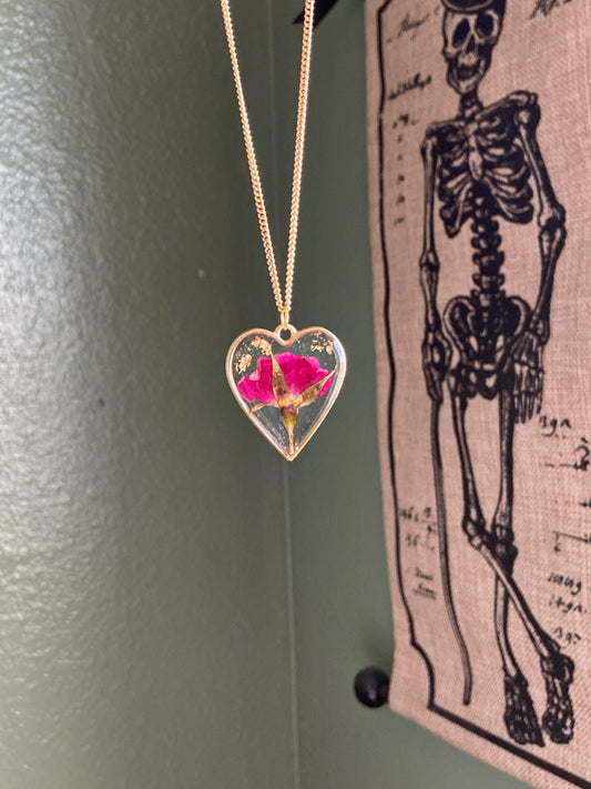 Roses- Red pressed rose buds & gold flake inside gold open heart-shaped matte pendant, 16" gold-plated chain included