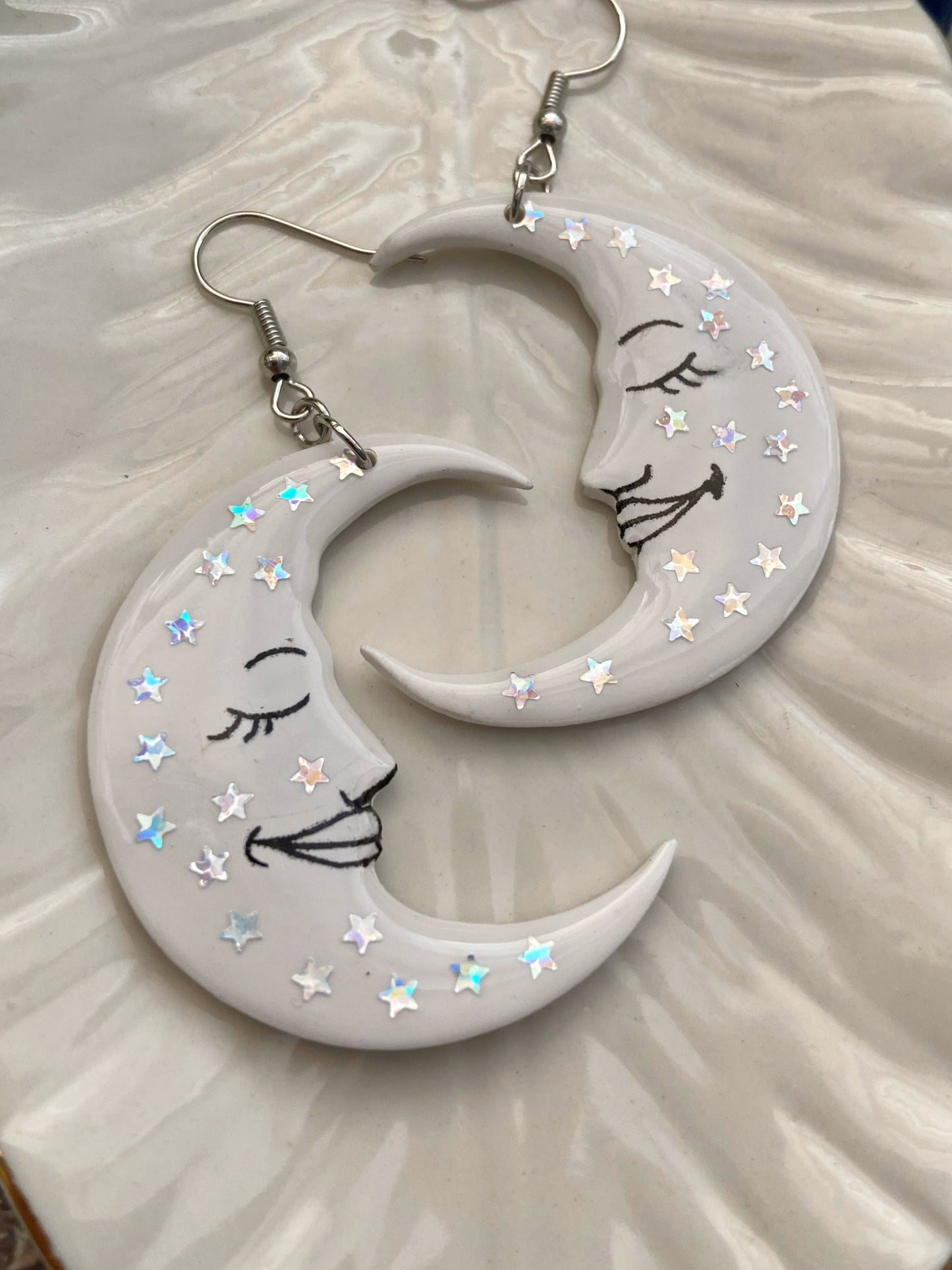 Sleepy Moons- White celestial crescent moon earrings with holographic rainbow glitter stars