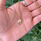 Baby's Breath - Dainty gold pendant with single white pressed flower inside, 16" gold plated chain included