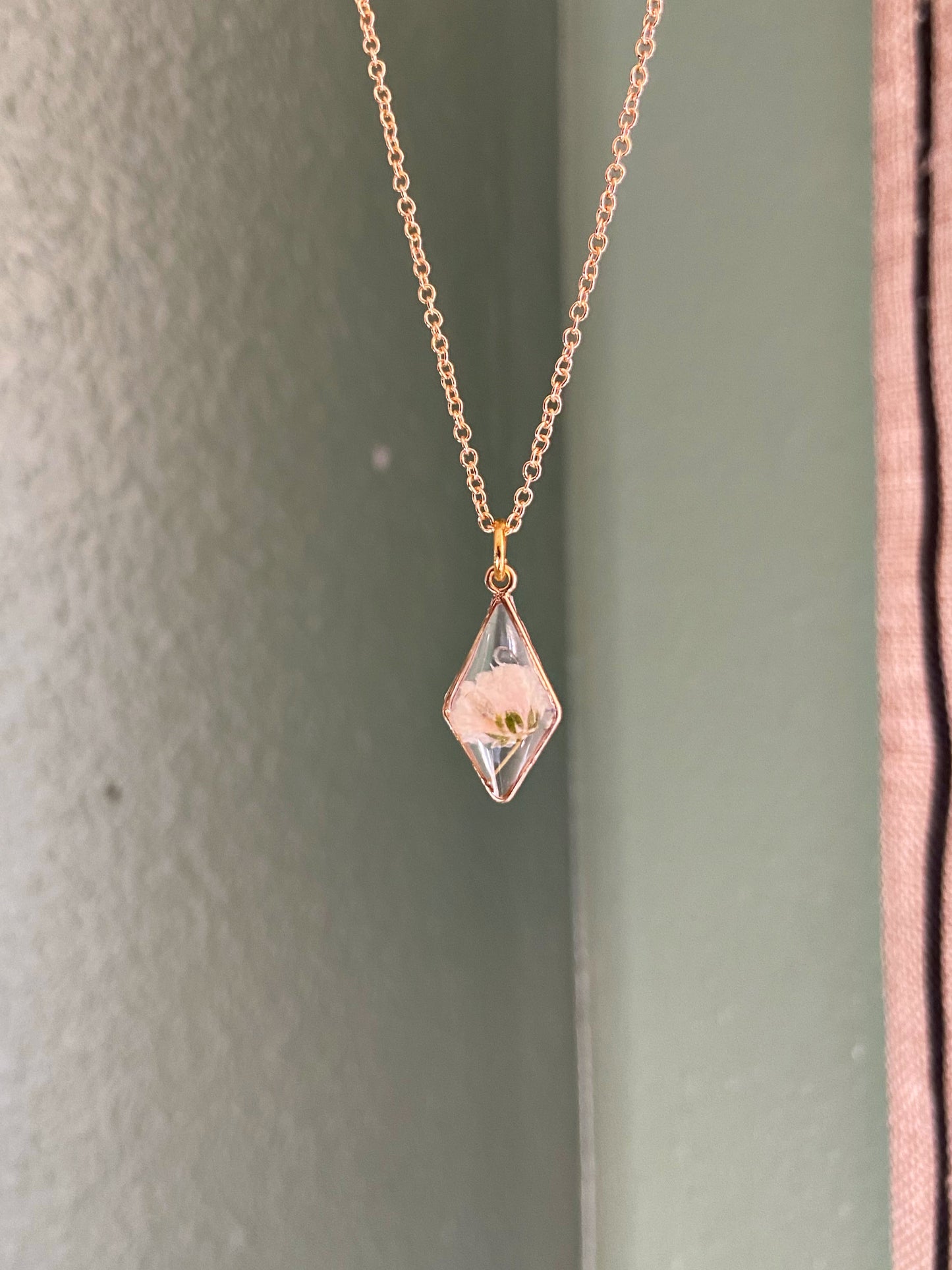 Baby's Breath - Dainty gold pendant with single white pressed flower inside, 16" gold plated chain included