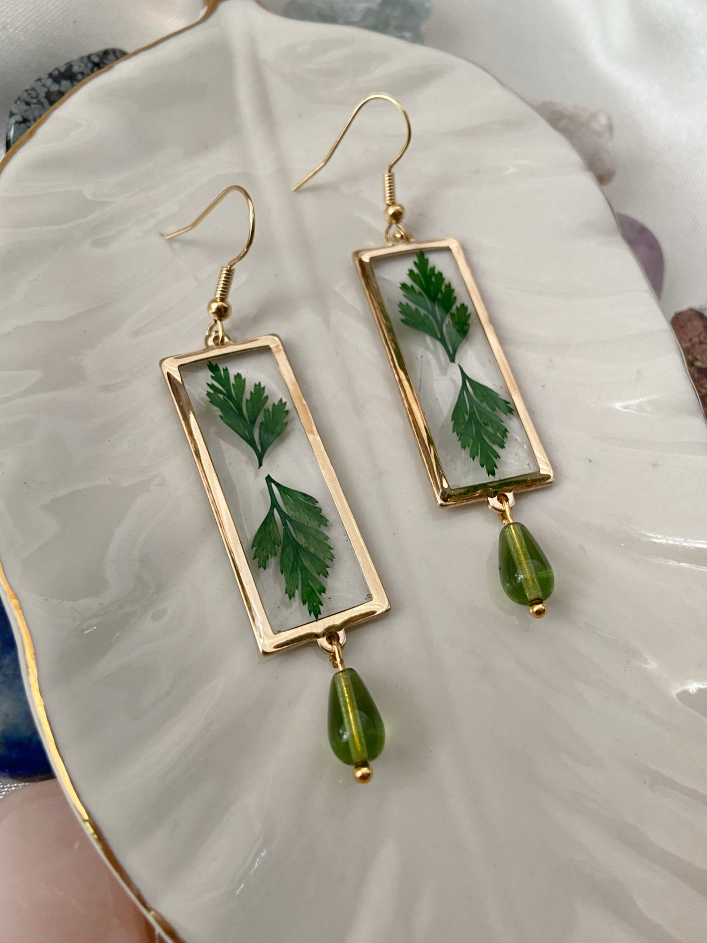 Greenery- Real pressed leaves symmetrically preserved inside long open gold rectangular earrings, olive green glass drop bead