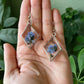 Forget Me Nots- Real blue flower clusters inside open silver diamond-shaped earrings