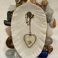 Larkspur- Pressed white flower inside large bronze open heart pendant, 16" bronze chain included