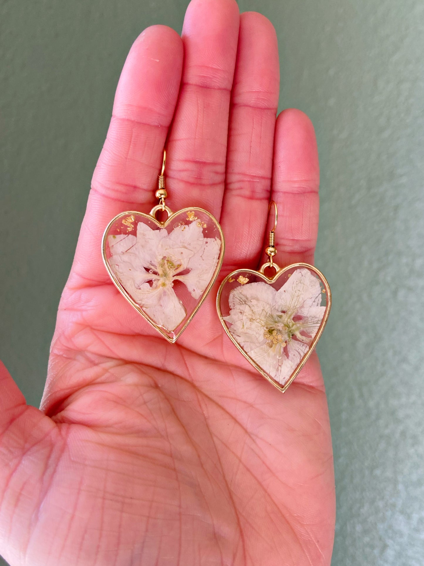 Larkspur- White pressed flowers and gold flake inside open gold heart earrings, preserved botanical jewelry