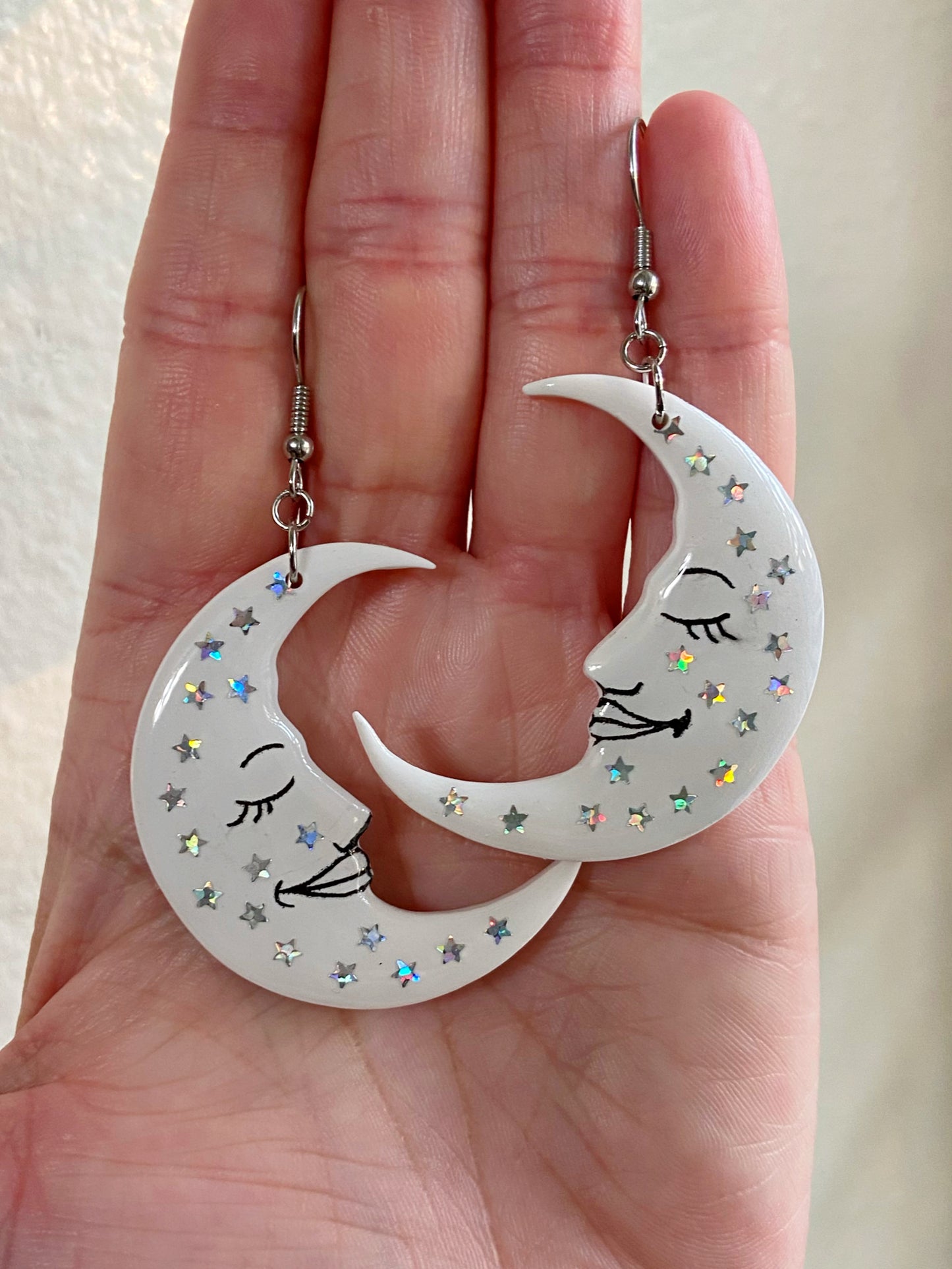 Sleepy Moons- White celestial crescent moon earrings with holographic rainbow glitter stars